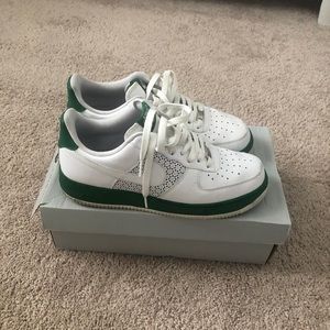 Green and white Air Force ones men